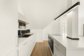 Küche - Repräsentative Penthousewohnung in stilvoller Ringstraßen-Villa