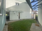 Zugang Wohnung - Reizende 2-Zimmer-Wohnung mit kleinem Garten